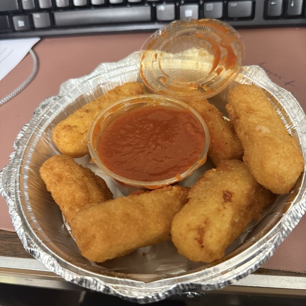 I came here for the first time and orders 6 mozzarella sticks for . It had no flavor. I wouldn't recommend this   6 Piece Mozzarella Sticks