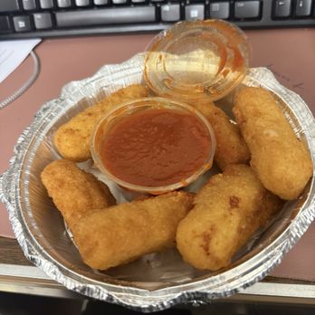 Napolini Pizzeria - I came here for the first time and orders 6 mozzarella sticks for . It had no flavor. I wouldn't recommend this   6 Piece Mozzarella Sticks - Pizza Near Me - Uniondale, New York