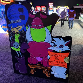 Monster Mini Golf Bellevue - pricing for mini golf is done by height. Small kids free, medium kids $12, big kids and adults $14. - Mini Golf Near Me - Bellevue, Washington Monster Mini Golf Bellevue - pricing for mini golf is done by height. Small kids free, medium kids $12, big kids and adults $14. - Mini Golf Near Me - Bellevue, Washington