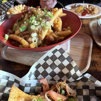 Devil's Elbow Ale & Smoke House - Nachos add pulled pork and poutine - Gastropubs Near Me - Vancouver, British Columbia Devil's Elbow Ale & Smoke House - Nachos add pulled pork and poutine - Gastropubs Near Me - Vancouver, British Columbia