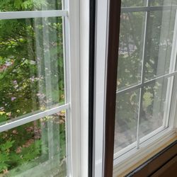 Soundproof Windows - black rubber outlining every window