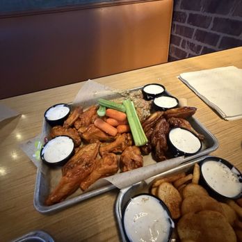 Buffalo Wild Wings - 5 wild, 5 original buffalo, 5 parmesan garlic, and 5 teriyaki; all traditional. All super sauced up and fresh! Carrots and celery with ranch - Sports Bars Near Me - Orange, California