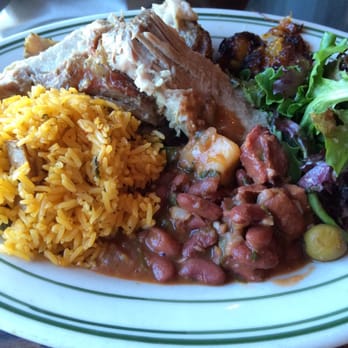 Parada 22 - Pernil asado (roasted pork, with Spanish rice, red beans, salad, and maduros) - Latin American Near Me - San Francisco, California Parada 22 - Pernil asado (roasted pork, with Spanish rice, red beans, salad, and maduros) - Latin American Near Me - San Francisco, California