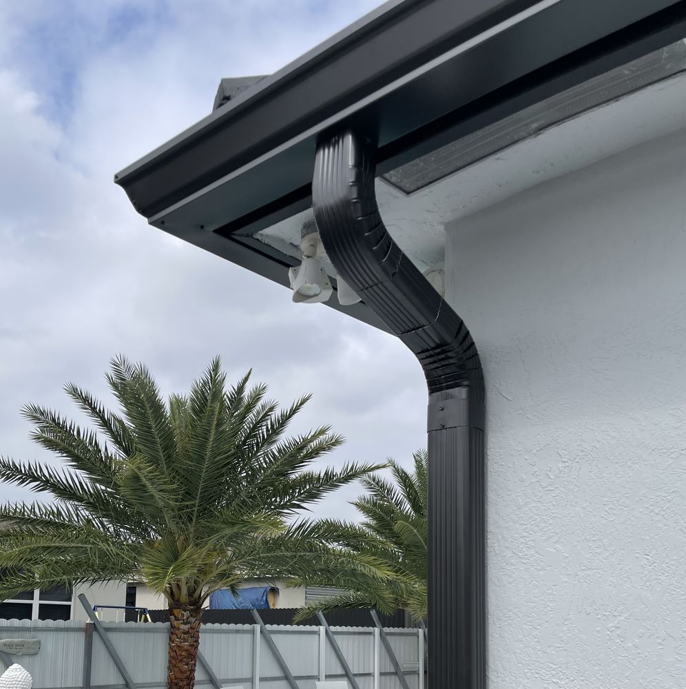 Slide of Jad Rain Gutters