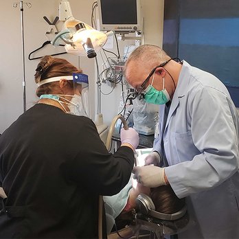 R David Brumbaugh, DDS - Dr. Brumbaugh operating on a patient - Cosmetic Dentists Near Me - Dallas, Texas R David Brumbaugh, DDS - Dr. Brumbaugh operating on a patient - Cosmetic Dentists Near Me - Dallas, Texas