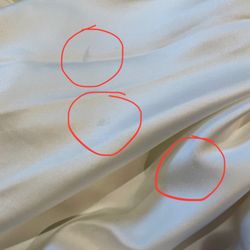 Seattle Wedding Dress Specialists - Remaining stains on wedding dress, post-cleaning
