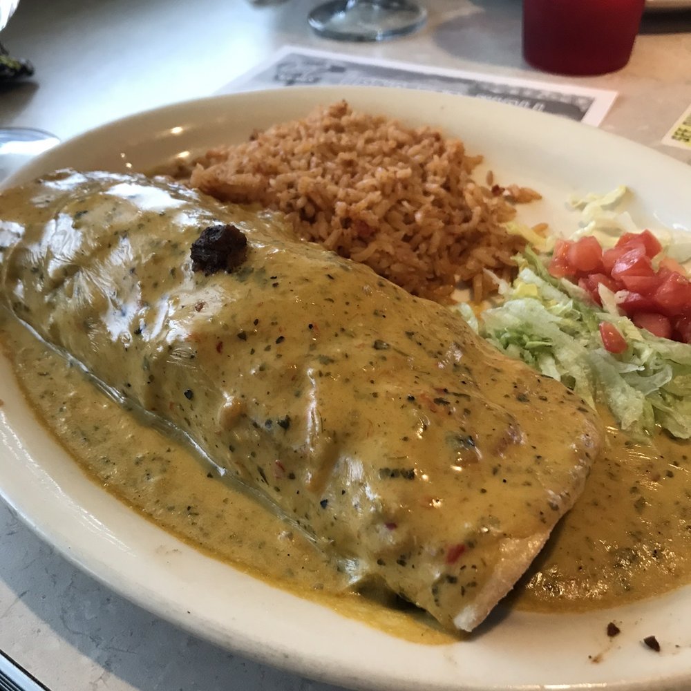 Chuy's - "Big as yo face" beef fajita burrito with boom boom sauce - Tex-Mex Near Me - Beavercreek, Ohio Chuy's - "Big as yo face" beef fajita burrito with boom boom sauce - Tex-Mex Near Me - Beavercreek, Ohio