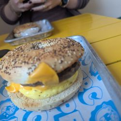 Perc Coffee - Bagel, Egg , and Cheese, with an add on of pork sausage