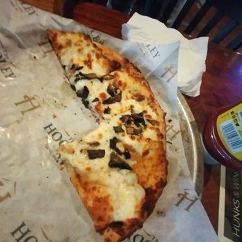 Hooley House Brooklyn - Everyone tore into this before the picture could be taken!  White garlic pizza. - Irish Near Me - Brooklyn, Ohio