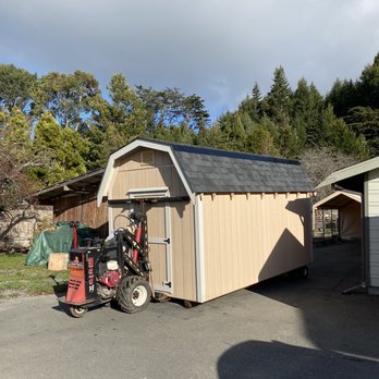 Junior Barns - a tractor parked in front of a shed - General Contractors Near Me - Fortuna, California