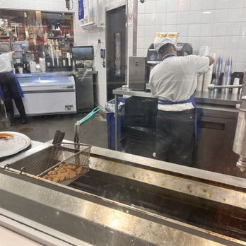 El Moro Churrería - Open grease vat for cooking fresh churros - Desserts Near Me - Costa Mesa, California El Moro Churrería - Open grease vat for cooking fresh churros - Desserts Near Me - Costa Mesa, California