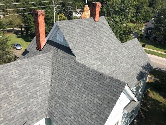 Slide of Roof Masters Roofing Solutions