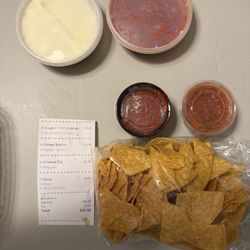Salsa's Bar and Grill - Absolutely doo doo amount of chips for someone who bought extra salsa and cheese dips... I mean at least add another bag?!