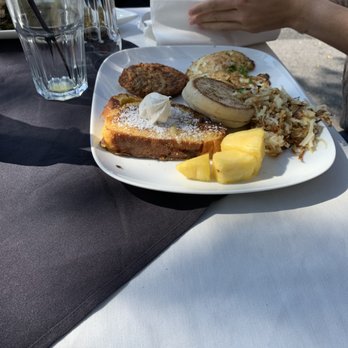 Twist fells point - Twist Royale with 2 over easy eggs, chicken sausage, english muffin, hash brown and fruit - Mediterranean Near Me - Baltimore, Maryland Twist fells point - Twist Royale with 2 over easy eggs, chicken sausage, english muffin, hash brown and fruit - Mediterranean Near Me - Baltimore, Maryland