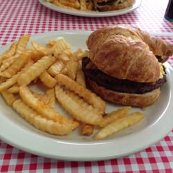 Country Club Cafe - Country Club Special Burger on a croissant. With scrambled egg on top.
