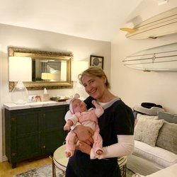 Blooming Baby Postpartum Doula and Nighttime Nurse - Jola & our daughter (wearing her hip brace)