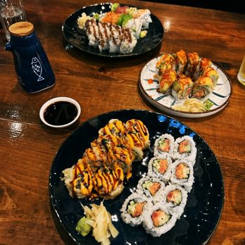 Oshio - Front: Friday Night Roll Spicy Tuna Roll Middle: Cherry Blossom Roll Back: Rainbow Roll Shrimp Tempura Roll - Sushi Bars Near Me - Columbus, Ohio