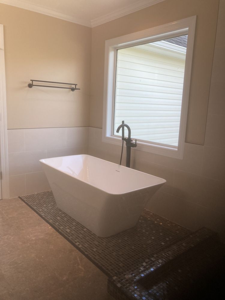 Slide of The Tile Guy