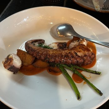Amaru - Pulpo a La Plancha (Charred octopus fermented pumpkin seed romesco broccolini, papas bravas) - Latin American Near Me - Chicago, Illinois Amaru - Pulpo a La Plancha (Charred octopus fermented pumpkin seed romesco broccolini, papas bravas) - Latin American Near Me - Chicago, Illinois