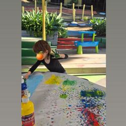 Hands on play, your child WILL get messy at this school.