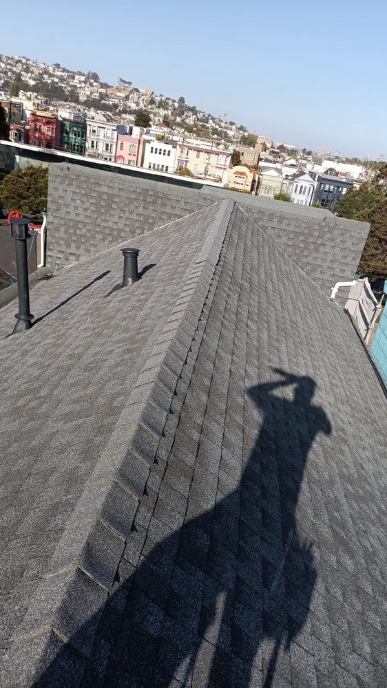 Slide of Green Group Roofing