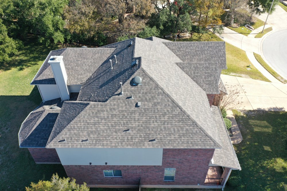 Slide of Otis Roofing