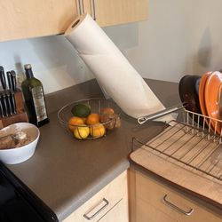 Top Notch Cleaners - Dishes in rack and paper towels left that way.