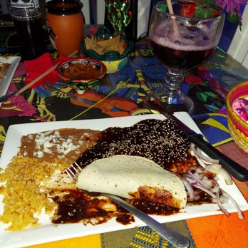 Jesses Carreta - Chicken Mole plate.  Grilled chicken breast smothered with mole sauce, sprinkled with sesame seeds. - Mexican Near Me - Puerto Peñasco, SON
