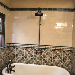 The rain shower is from Signature Hardware - and they were really helpful over the phone helping get the right parts.