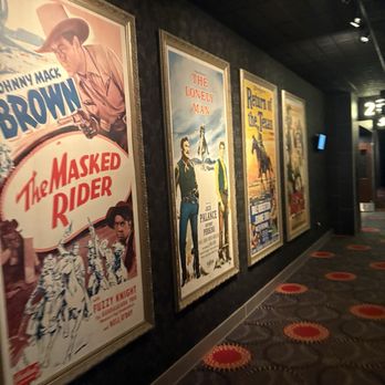 Flix Brewhouse - Old movie posters in the hallway - Brewpubs Near Me - Katy, Texas Flix Brewhouse - Old movie posters in the hallway - Brewpubs Near Me - Katy, Texas