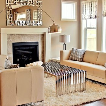 Mojo Design - a living room with a fireplace and couches - Interior Design Near Me Mojo Design - a living room with a fireplace and couches - Interior Design Near Me