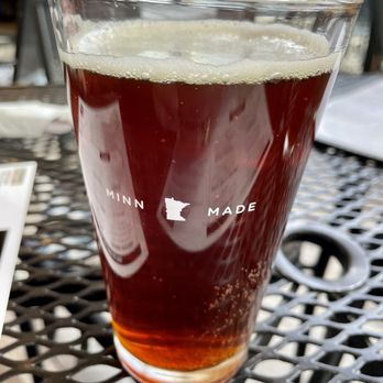 Iron Tap - a glass of beer on a table - New American Near Me - Waconia, Minnesota