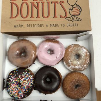 Duck Donuts - Upper right corner is supposed to be a powdered sugar donut - Donuts Near Me - Arlington, Virginia Duck Donuts - Upper right corner is supposed to be a powdered sugar donut - Donuts Near Me - Arlington, Virginia