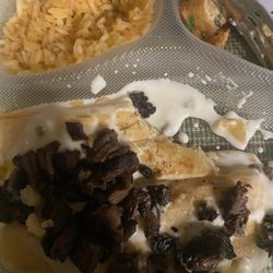 Mami’s Mexican - Steak Enchilada with meat outside, lazy execution