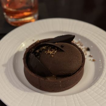 Upstairs at the Gwen - Dark Chocolate & Salted Caramel Tart - Bars Near Me - Chicago, Illinois Upstairs at the Gwen - Dark Chocolate & Salted Caramel Tart - Bars Near Me - Chicago, Illinois