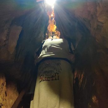 Moaning Caverns Adventure Park - Photo of my 6'3" husband vs. tiny passageway for reference - Amusement Parks Near Me - Vallecito, California Moaning Caverns Adventure Park - Photo of my 6'3" husband vs. tiny passageway for reference - Amusement Parks Near Me - Vallecito, California