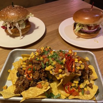 Veggie Grill by Next Level - Left: Santa Fe Chickin', right: VG Classic, front: Southwestern Nachos - Vegan Near Me - Seattle, Washington Veggie Grill by Next Level - Left: Santa Fe Chickin', right: VG Classic, front: Southwestern Nachos - Vegan Near Me - Seattle, Washington