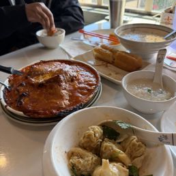 Baked pork chop over rice, fish porridge with Chinese donut Baked pork chop over rice, fish porridge with Chinese donut