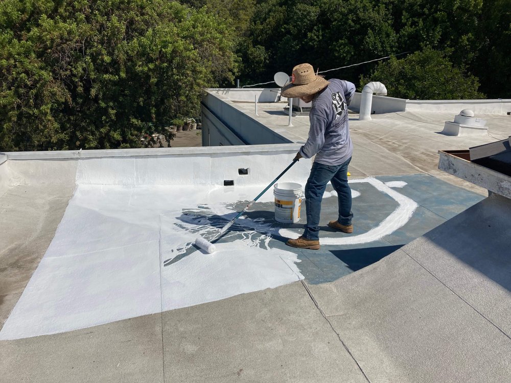 Slide of Wences Roofing Team