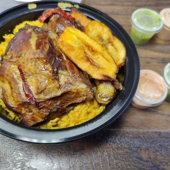 Punta Cana Dominican Grill - Dark Meat Chicken Stew Bowl - Maduros and Yellow Rice - Dominican Near Me - Westbury, New York Punta Cana Dominican Grill - Dark Meat Chicken Stew Bowl - Maduros and Yellow Rice - Dominican Near Me - Westbury, New York