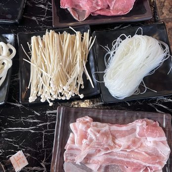 Zu Hot Pot - Beef, pork belly, mushrooms and clear noodles with uson noodles. These are the topping sizes - Hot Pot Near Me - Albuquerque, New Mexico