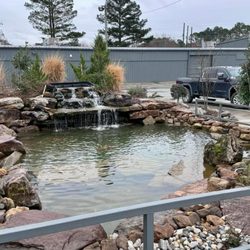 Asian Super Market - Amazing Koi pond in front of the store.