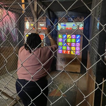 The Axe Lair - Axe Lair throwing the axe at one of the games we chose to play! - Axe Throwing Near Me - Upland, California The Axe Lair - Axe Lair throwing the axe at one of the games we chose to play! - Axe Throwing Near Me - Upland, California