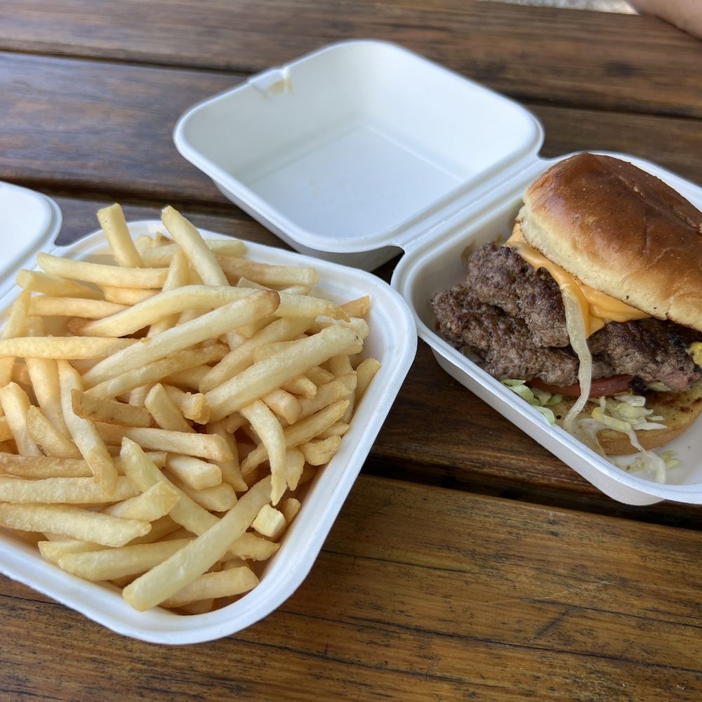 Double smash burger and a side of fries Double smash burger and a side of fries