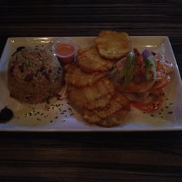 Shrimp with rice and beans and tostones. Shrimp with rice and beans and tostones.