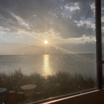 Miller's Waterfront Restaurant - sunset from indoor main dining room - Seafood Near Me - Nags Head, North Carolina
