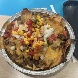 Barbacoa and grilled chicken nachos Barbacoa and grilled chicken nachos
