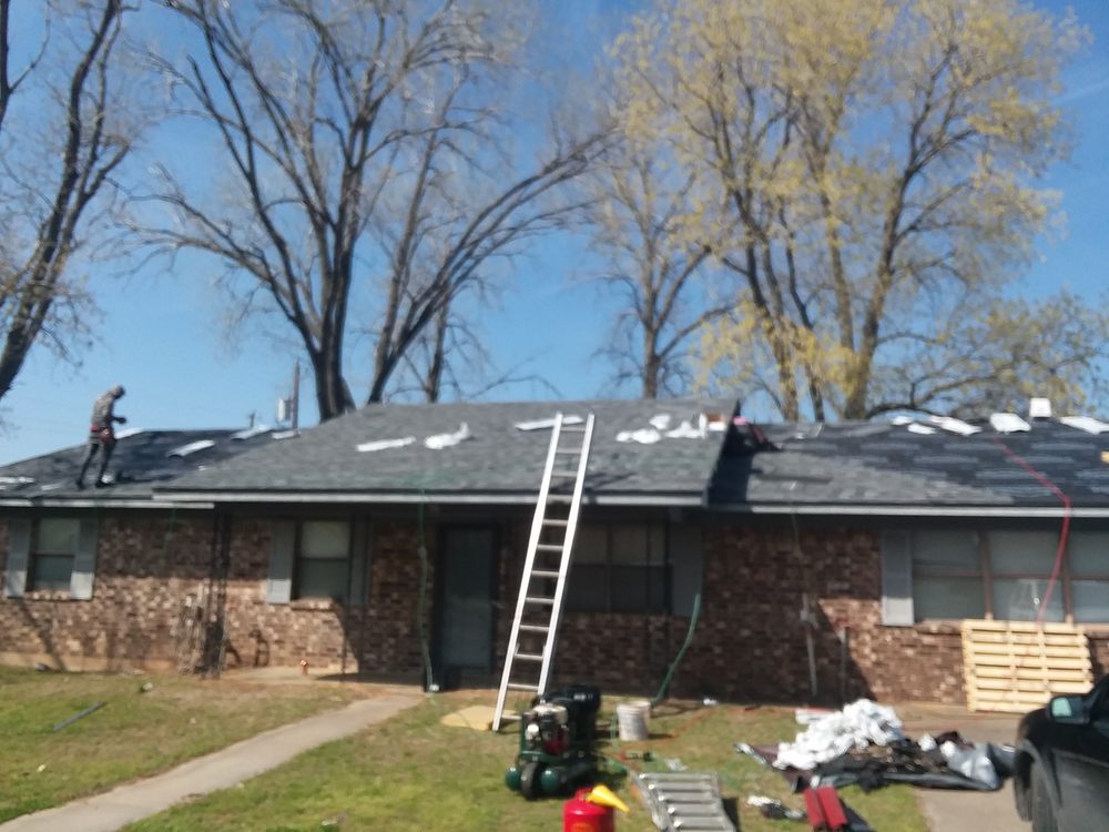 Slide of Rick's Roofing & Construction