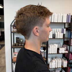 Artistic Strands Salon & Spa - At Artistic Strands, we create clean, sharp taper cuts with smooth fades and precise detailing for a fresh, polished look that fits your sty