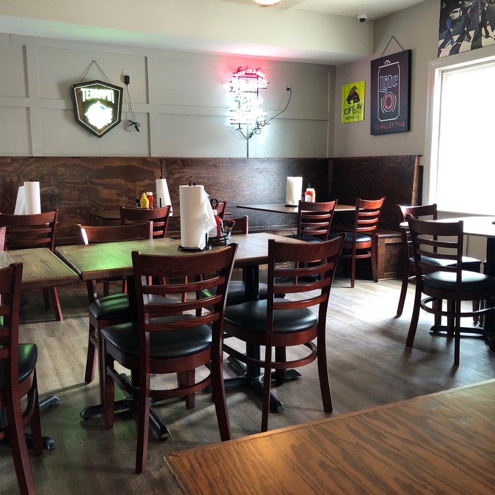 Blind Pig Tavern - tables and chairs in a restaurant - American Near Me - Watkinsville, Georgia